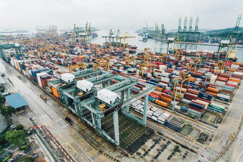 Sea port cargo handling helpers and marine container lashing crew in UAE ports